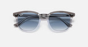 Ray-Ban Hawkeye sunglasses, translucent brown frame with dark blue polarized lenses