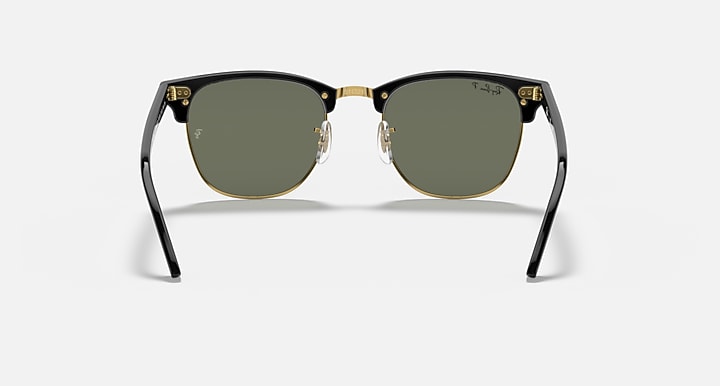 Ray-Ban Clubmaster sunglasses front view with dark lenses, black frame, gold-tone bridge