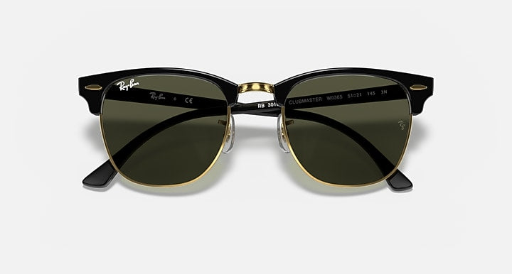 Ray-Ban Clubmaster sunglasses, black frames with tortoise temples and gold accents