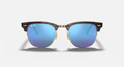 Clubmaster-style sunglasses with tortoiseshell frame and sky blue gradient lenses