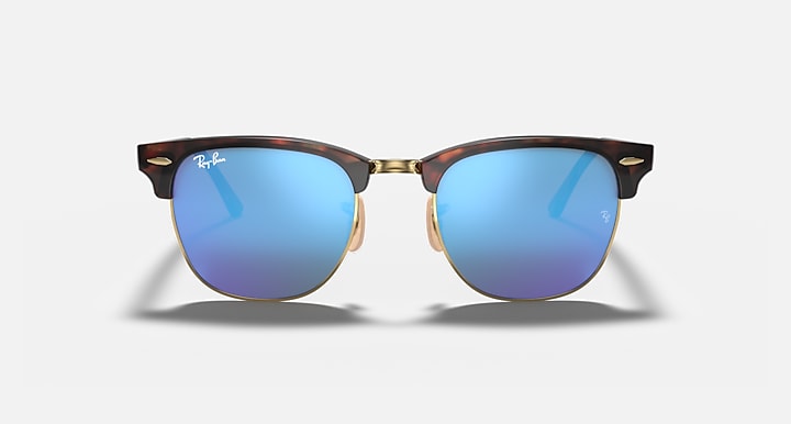 Clubmaster-style sunglasses with tortoiseshell frame and sky blue gradient lenses