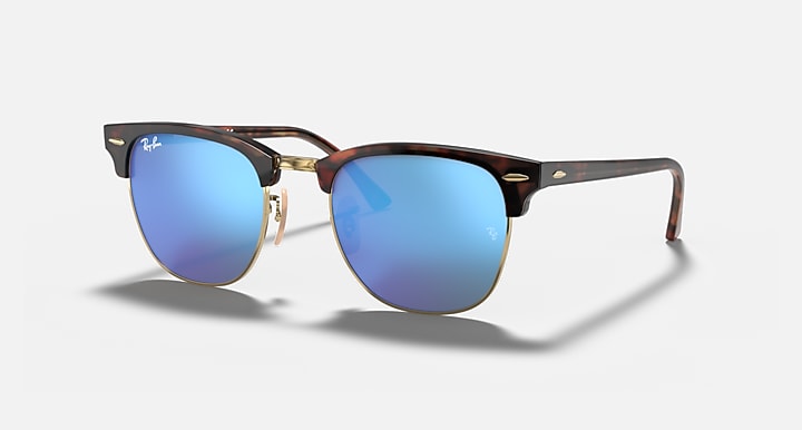 Clubmaster-style sunglasses with tortoiseshell frame and blue gradient lenses