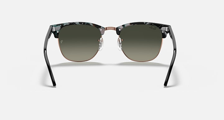 Ray-Ban Clubmaster sunglasses front view, tortoise-pattern frame with dark green lenses
