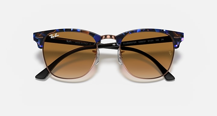 Ray-Ban Clubmaster sunglasses with blue tortoise frame and brown lenses with black tips