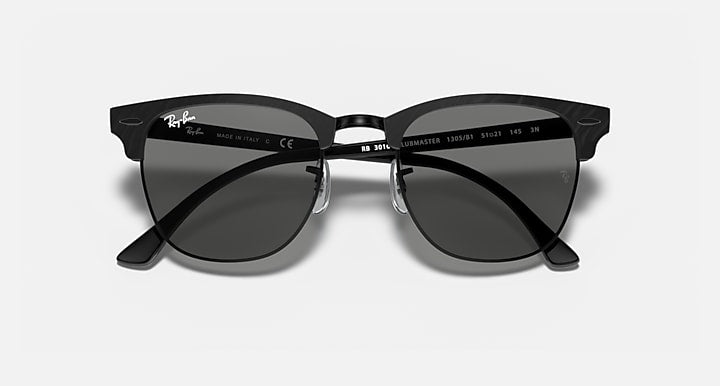 Ray-Ban Clubmaster sunglasses with black frame and dark gray lenses, printed details visible