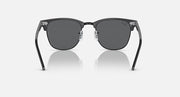 Black Clubmaster-style sunglasses with dark grey lenses, front view