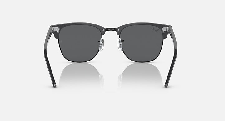 Black Clubmaster-style sunglasses with dark grey lenses, front view