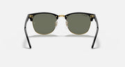 Clubmaster-style sunglasses front view; dark green lenses, rounded black frame, gold bridge