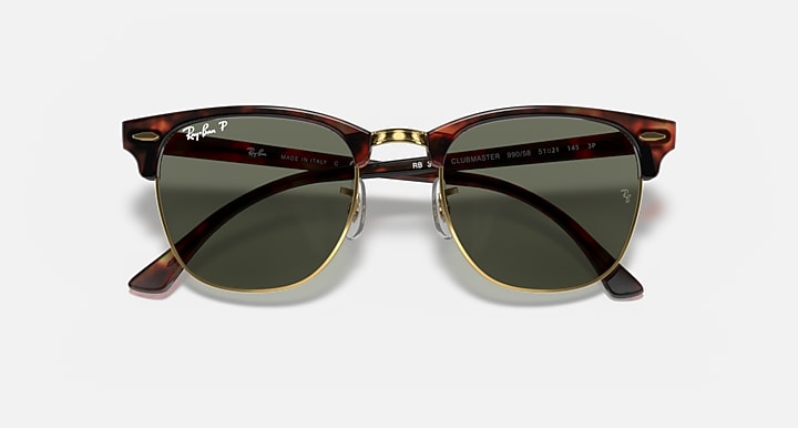 Clubmaster sunglasses with red-brown tortoise frame and green tinted lenses