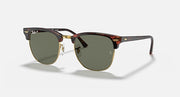 Clubmaster sunglasses with tortoise frame and green tinted lenses