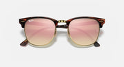 Ray-Ban Clubmaster sunglasses with black frame and pink-tinted gradient lenses