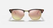 Ray-Ban Clubmaster sunglasses with dark tortoise frame and pink-to-gold gradient lenses