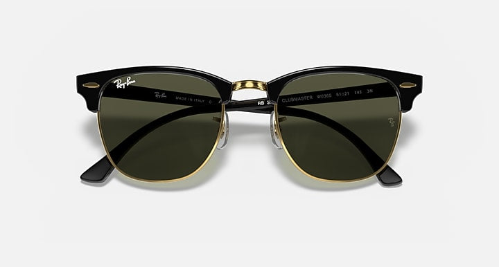 Ray-Ban Clubmaster sunglasses front view, black frame with gold-tone details and green lenses
