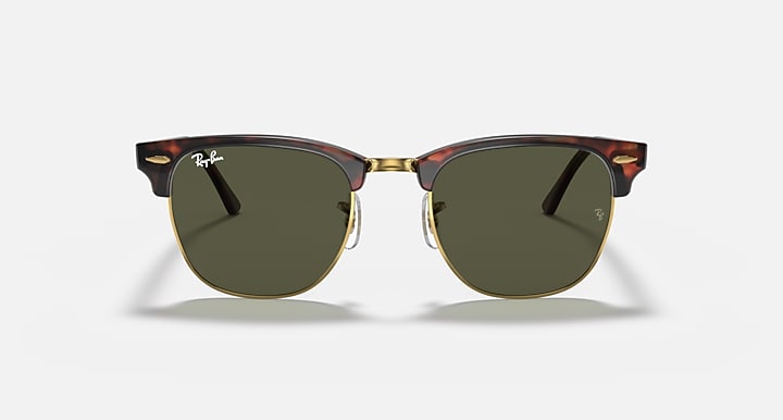 Tortoise Clubmaster sunglasses with round dark green lenses and gold bridge