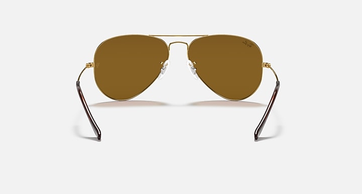 Ray-Ban Aviator sunglasses with metal frame and dark brown gradient lenses