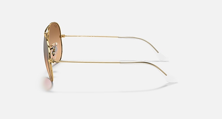 Ray-Ban Aviator RB3025 sunglasses with gold metal frame and light brown lenses