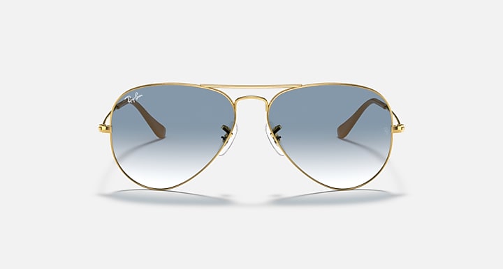 Ray-Ban aviator sunglasses with gold frame and blue tinted lenses