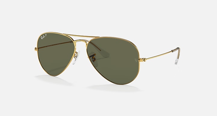 Aviator sunglasses with gold frame and dark green mirrored lenses