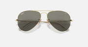 Ray-Ban aviator sunglasses, gold frame with dark gradient lenses, front view