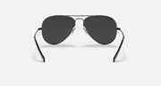 Ray-Ban aviator sunglasses with thin metal frame and dark charcoal tinted lenses.