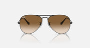 Ray-Ban aviator sunglasses with black frame and brown gradient lenses