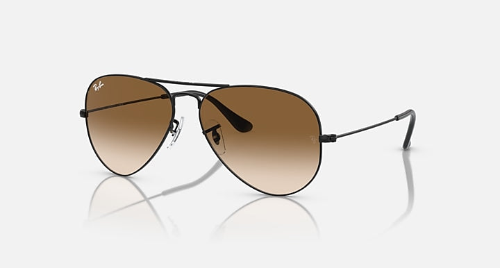 Ray-Ban aviator sunglasses with black frame and brown gradient lenses