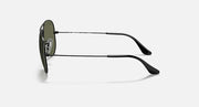 Ray-Ban aviator sunglasses with dark metal frame and dark lenses with black tips