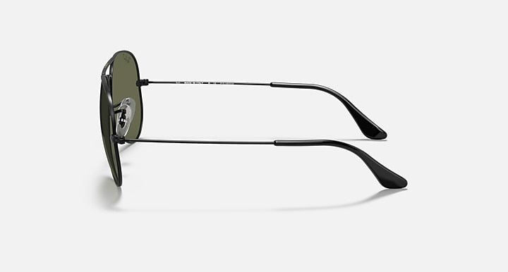 Ray-Ban aviator sunglasses with dark metal frame and dark lenses with black tips