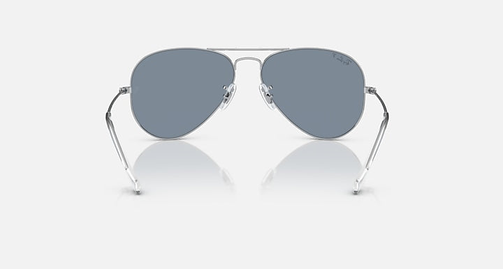 Aviator sunglasses with grey-blue lenses and silver-tone metal frame
