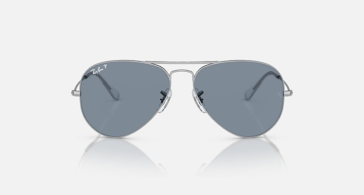 Ray-Ban aviator sunglasses with silver frame and light blue-gray lenses