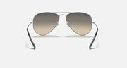 Ray-Ban Aviator sunglasses with metal frame and warm brown gradient lenses
