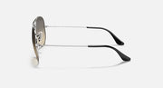 Silver aviator sunglasses with dark lenses and black curved temple tips