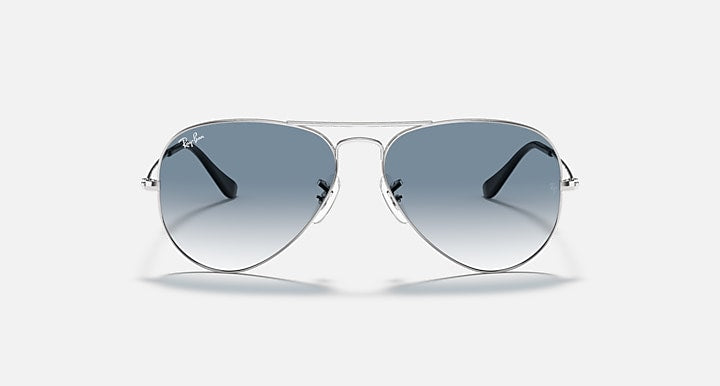 Silver-tone aviator sunglasses with blue-gray mirrored lenses and metal frame