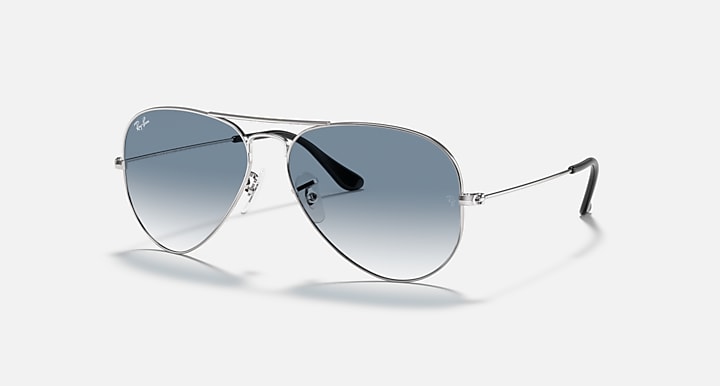 Silver aviator sunglasses with light blue-gray gradient lenses and thin metal arms