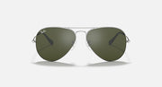Silver aviator sunglasses with dark olive green lenses and gradient tint