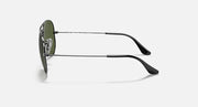 Ray-Ban Aviator sunglasses with silver frame and green-tinted lenses with dark arms