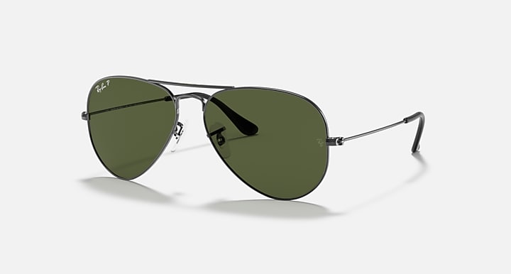 Aviator sunglasses with silver frame and dark green mirrored lenses