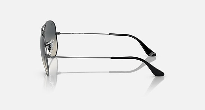 Aviator sunglasses, left side view, black metal frame with dark lenses