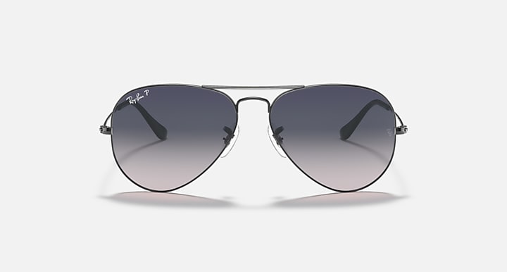 Black aviator sunglasses with dark gray tinted lenses and metal bridge