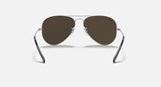 Ray-Ban aviator sunglasses with thin metal frame and dark gray tinted lenses.