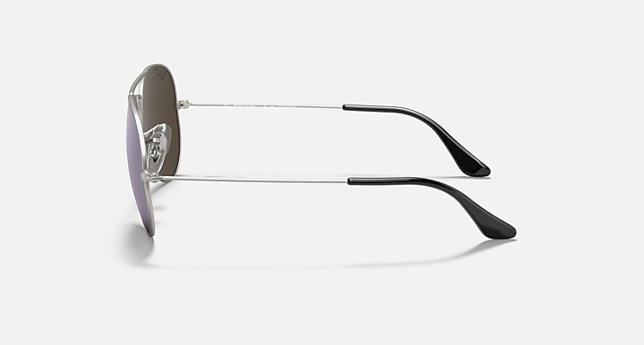 Ray-Ban Aviator sunglasses with silver frame and violet-tinted lenses with dark arms