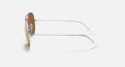 Ray-Ban Aviator sunglasses with silver frame and amber-tinted lenses