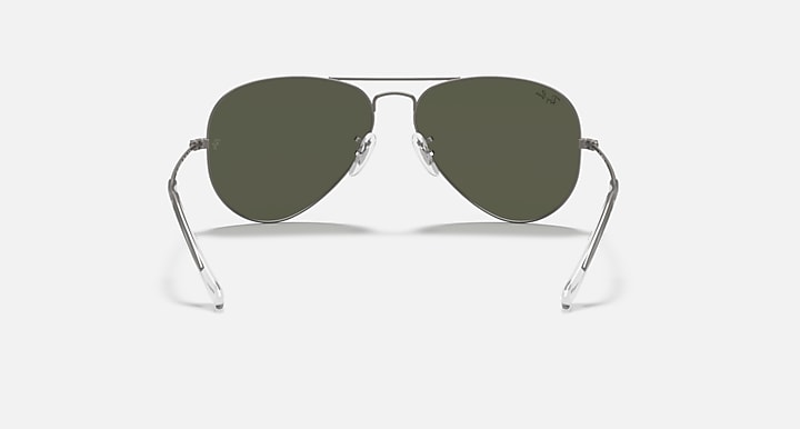 Ray-Ban aviator sunglasses with dark green lenses and grey metal frame temples