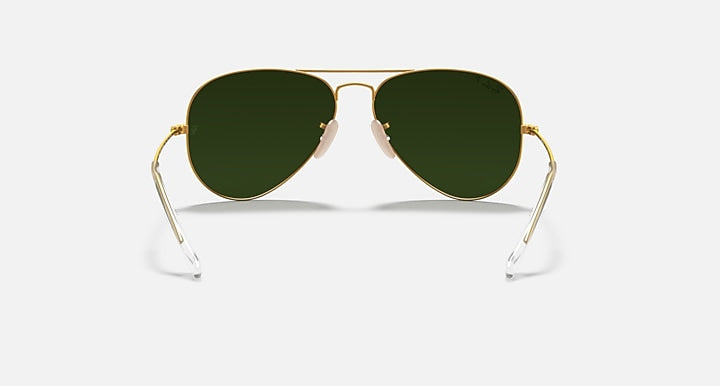 Ray-Ban aviator sunglasses with dark green lenses and gold metal frame