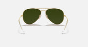 Ray-Ban aviator sunglasses with dark green lenses and gold metal frame