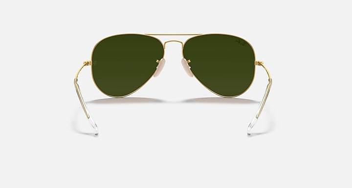 Ray-Ban aviator sunglasses with dark green lenses and gold metal frame
