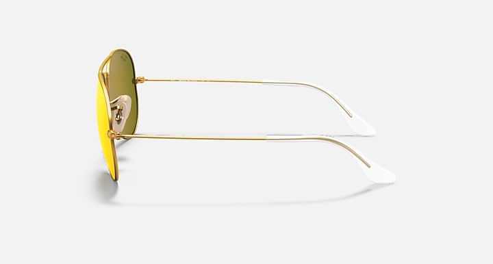 Ray-Ban Aviator sunglasses with gold frame and yellow-green tinted lenses