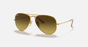 Ray-Ban aviator sunglasses with gold frame and warm amber-tinted lenses