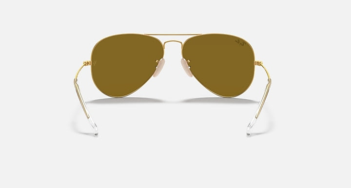 Ray-Ban aviator sunglasses with gold metal frame and olive-brown tinted lenses