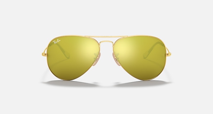 Gold aviator sunglasses with yellow lenses and full gradient tint